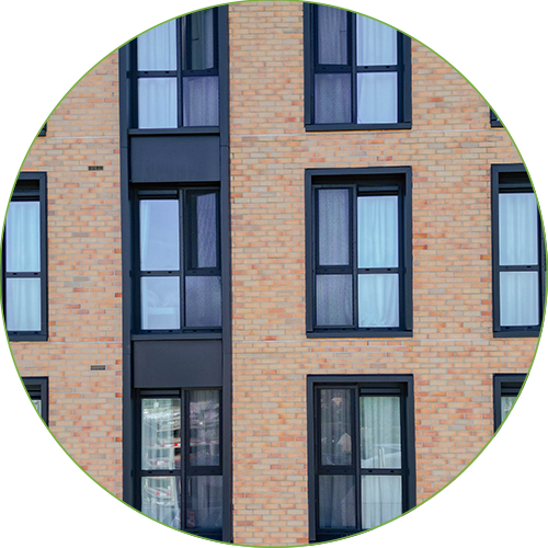 Detail of the facade of the high-rise residential tower Bailey Point in London with DucoMax window vents