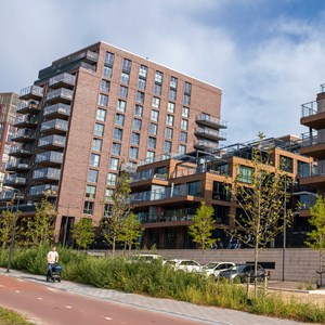 Wonen in de stad met uitzicht op groen